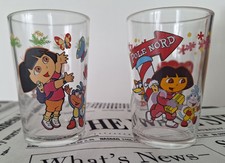 LOT DE DEUX VERRES A  MOUTARDE " AMORA "  DORA L EXPLORATRICE 