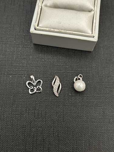 Lot pendentif en argent - de,