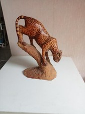 sculpture en bois art  1920 panthere tacheté sur tronc hauteur 23 cm x 16 cm