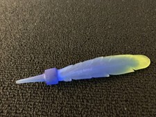 Plume bouchon flacon Hilton Mc