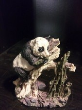 PANDA HANGING ON LIMB RESIN