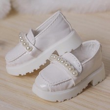 Chaussures miniatures à