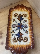 Plat rectangulaire signé