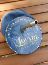 Ancien gonfleur à main publicitaire M5 GRANDS MAGASINS DU LOUVRE pneumatiques