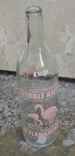 Bouteille en verre Petrole raffiné le Flamant Rose, L. Pichon Arles sur Rhône