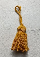 Ancien pompon jaune de porte