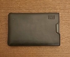 HEWLETT-PACKARD  Calculatrice HP 12C  Calculator Pochette Piles/avec  Cache Pile