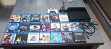Vends PS4 avec 1 manette 1 support manettes et 20jeux
