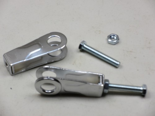 Pair chain adjuster for - pair, of