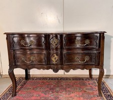 Commode sauteuse à 2 rangs de tiroirs en noyer de forme arbalète époque XVIIIème