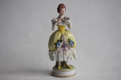 Figurine porcelaine vieux