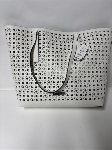 Sac main - À,