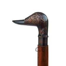 ancien avec manche tête de