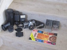 Appareil photo Olympus OM-2 avec objectifs et accessoires