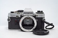 Reflex Argentique OLYMPUS OM-10 OM10 35mm Film SLR + BOUCHON/PILES