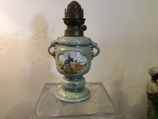 # Ancienne lampes en porcelaine à pétrole Barbotine décor chasse japonisant 