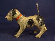 Ancien jouet mécanique tôle