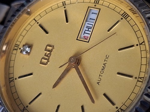 Ancienne montre automatic - q&q,