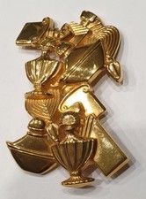 Grande broche Guerlain Signée Métal doré Parfums