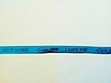 Ruban parfum Loulou blue I love you de Cacharel, largeur 1 cm, longueur 1m