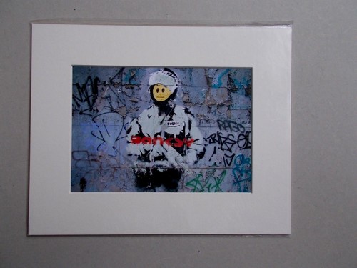 Banksy riot cop photo - banksy,