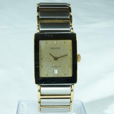 Montre unisexe RADO DiaStar 160.0281.3N cadran doré quartz d'occasion fonctio...