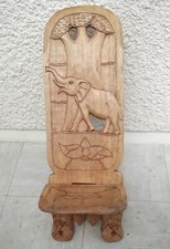 Chaise africaine motif éléphant en bois massif.