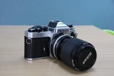 Appareil photo reflex Nikon FE2 + Nikkor 35/105 mm 3.5/4.5 argentique vintage