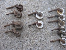 lots 4 pcs  Assorted Sizes Vintage Porcelain and Rustic Rusty Steel Casters 