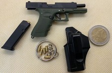 G17 Noir/Olive (Echelle 1:3) + 1 chargeur + 6 munitions + Holster & Support