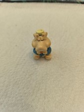 Figurine embout de crayon