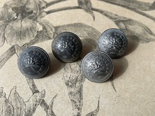 Ensemble de 4 boutons anciens