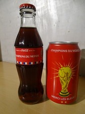 bouteille + canette coca cola