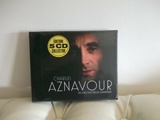 Coffret neuf 5 CD COLLECTOR CHARLES AZNAVOUR LES 100 PLUS BELLES CHANSONS