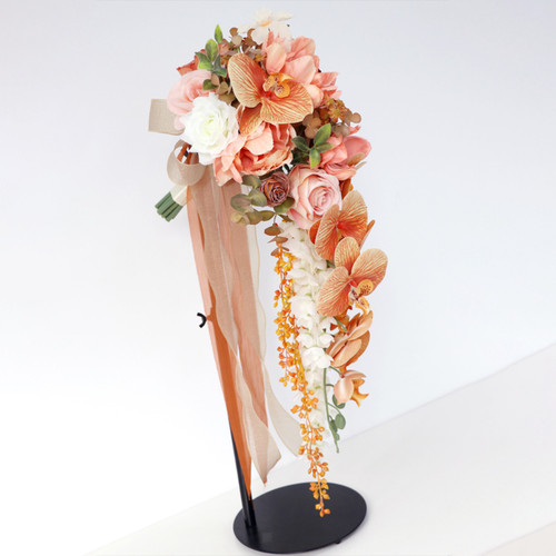 Bouquet tenant - , de
