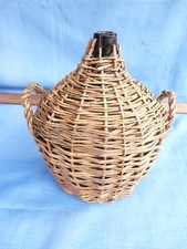 ANCIENNE BOMBONNE EN VERRE ET TRESSE AVEC DE L'OSIER