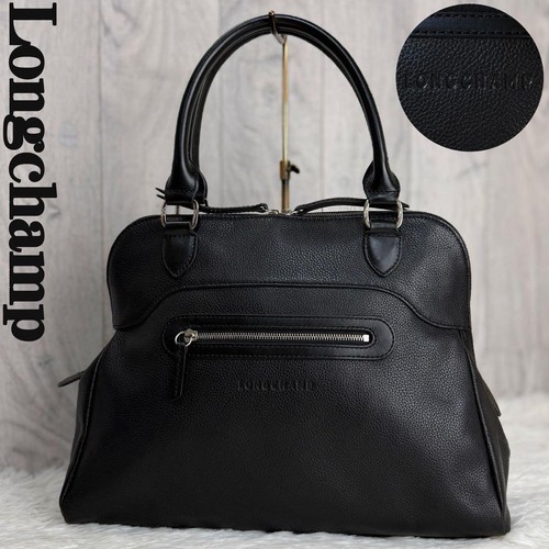 Longchamp brand logo - longchamp,