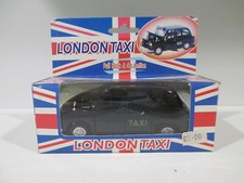 AUSTIN FX4 TAXI LONDON PULL BACK GO ACTION / FRICTION par WELLY 9850 au 1/36