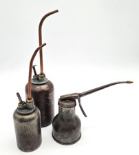 3 anciennes burettes à piston