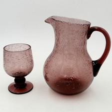 Biot, Pichet et verre à pied en verre soufflé, signés, XXe siècle.