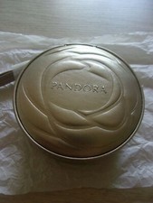 sac pochette à bijoux écrin boîte ronde dorée Pandora