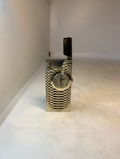 ANCIEN BRIQUET DE MARQUE RIVO SUISSE AVEC MONTRE DE MARQUE FERC N°619