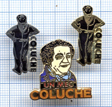 Lot de 3 PIN´S COLUCHE / C’est l'histoire d'un mec + debout couleur argent et or