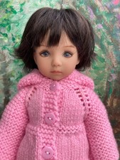 lot de vêtements pour poupée