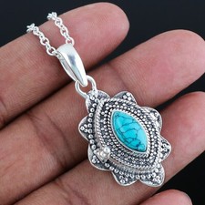 Pendentif poison turquoise