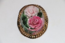 broche ancienne  lucite motif