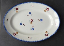 Grand plat ovale en faïence, genre Sarreguemines Fleur d'Alsace ou Dannemarie