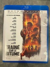 TRAINÉ SUR LE BITUME - film