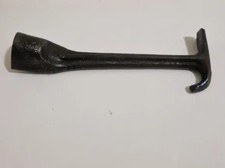 Clé a crochet pour poele a