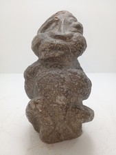 Ancienne statuette en pierre
